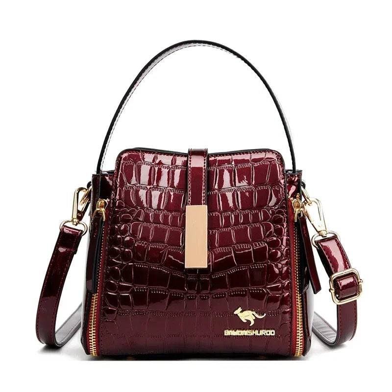Sac à main en cuir verni pour femmes, sac seau en cuir de haute qualité avec poche intérieure, sac à bandoulière de marque de luxe pour femmes.