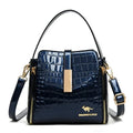 Sac à main en cuir verni pour femmes, sac seau en cuir de haute qualité avec poche intérieure, sac à bandoulière de marque de luxe pour femmes.