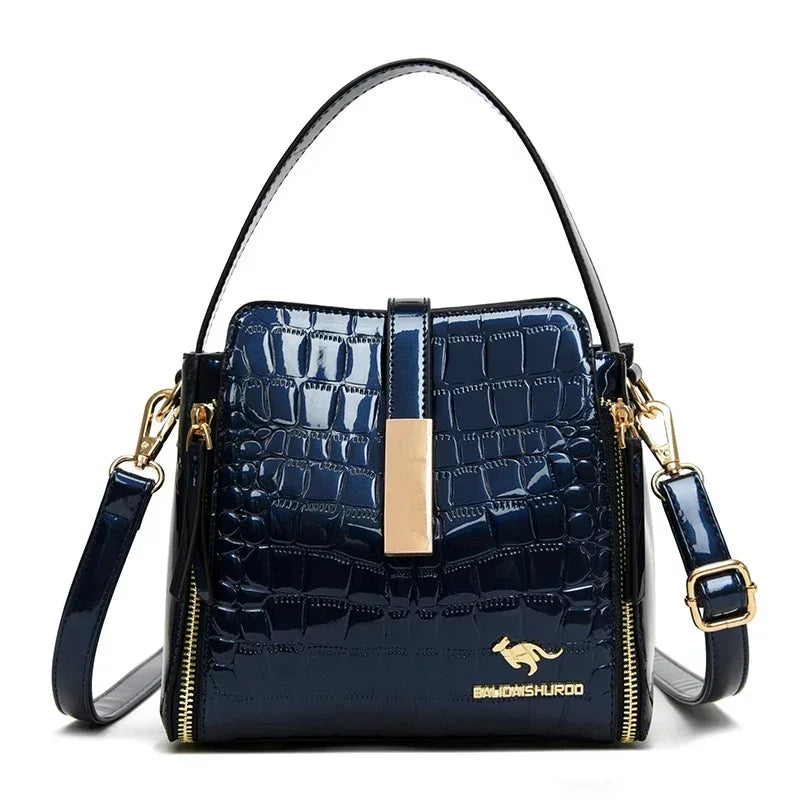Sac à main en cuir verni pour femmes, sac seau en cuir de haute qualité avec poche intérieure, sac à bandoulière de marque de luxe pour femmes.