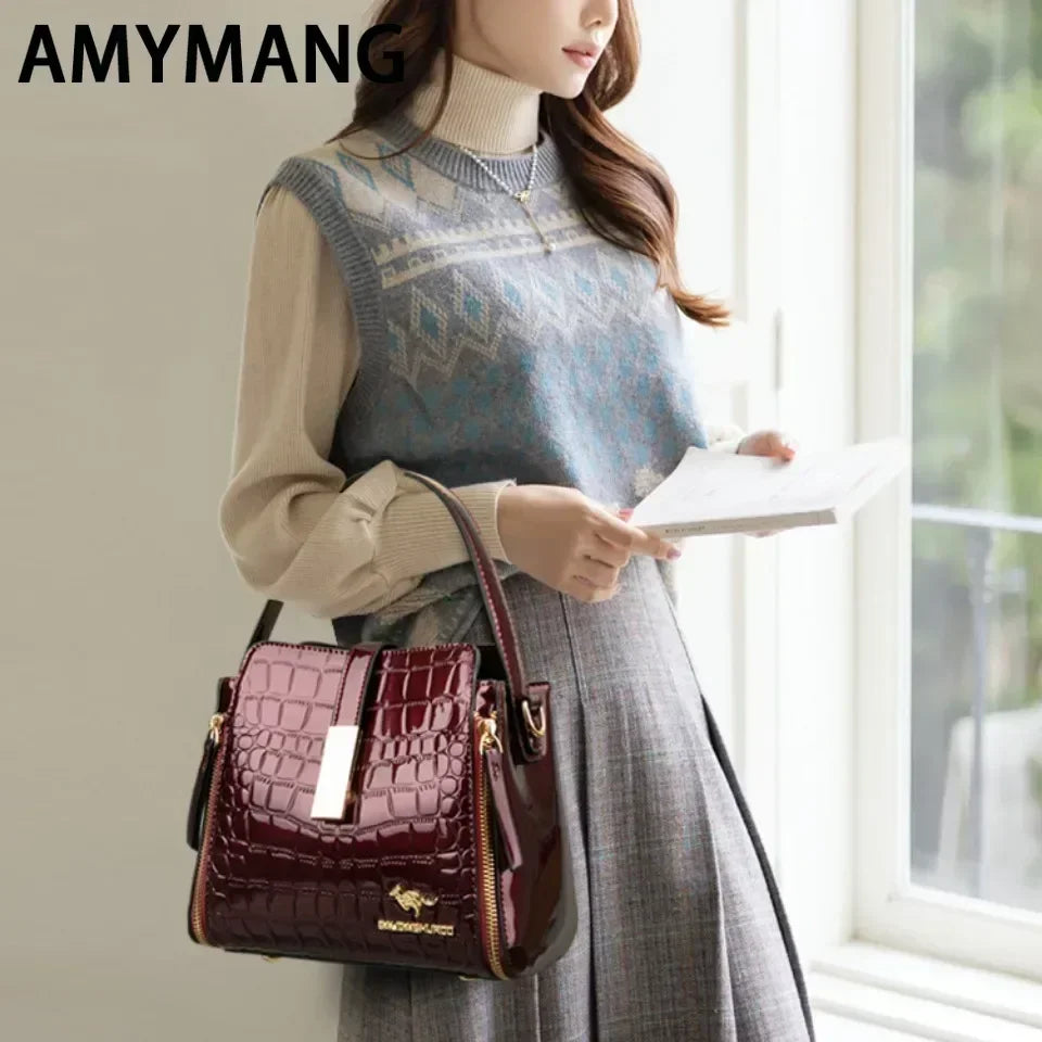 Sac à main en cuir verni pour femmes, sac seau en cuir de haute qualité avec poche intérieure, sac à bandoulière de marque de luxe pour femmes.
